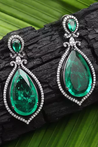 Green kundan dangler earrings