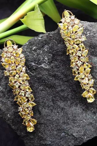 Gold kundan cubic zirconia dangler earrings