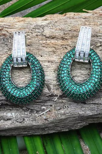 Green kundan cubic zirconia dangler earrings