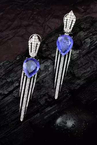 Purple kundan dew drop shaped dangler earrings