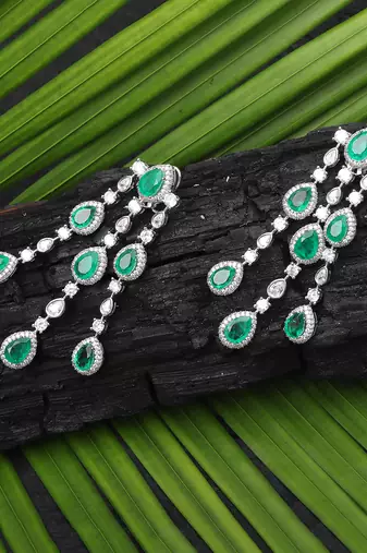 Emerald green kundan dangler earrings