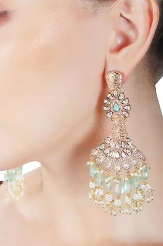 Green kundan dangler earrings