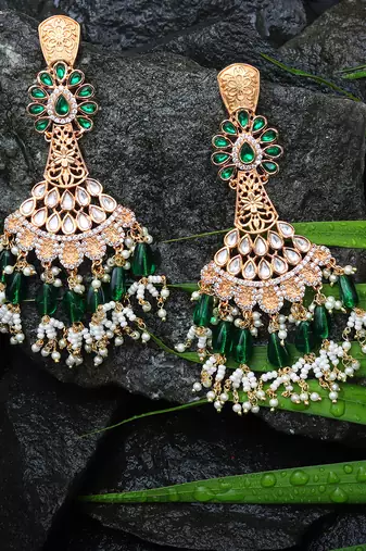 Green kundan dangler earrings
