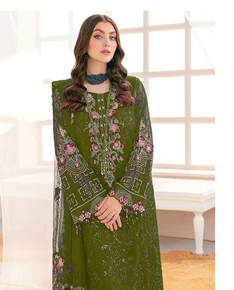 Oliv green pakistani suite with embroidery work