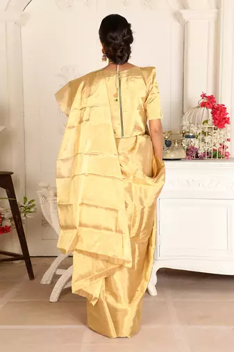 Gold handwoven zari tissue saree set