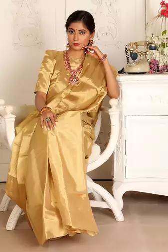 Gold handwoven zari tissue saree set