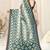 Light green cotton patola print coper zari border saree with unstitched blouse piece