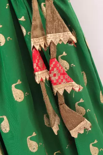 Sleeveless Patola Woven Angarakha Style Choli With Glitter Fish Print Ghagra- Red & Green