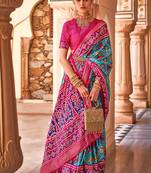 Unique Patola Style Saree With Gold Printed On Turquoise   Colour Silk Fabric