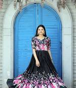 Fancy Girlish Partywear Floral Print Gown For Graceful Looks In Black Colour