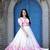 Fancy Girlish Partywear Floral Print Gown For Graceful Looks In White Colour