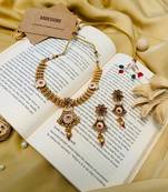 Finely crafted meenakari antique golden plated matt finish necklace with pair of earrings