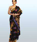 Black jamdani saree with all over flower motifs