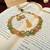 Aesthetic kempstone matt golden finish necklace with pair of earrings