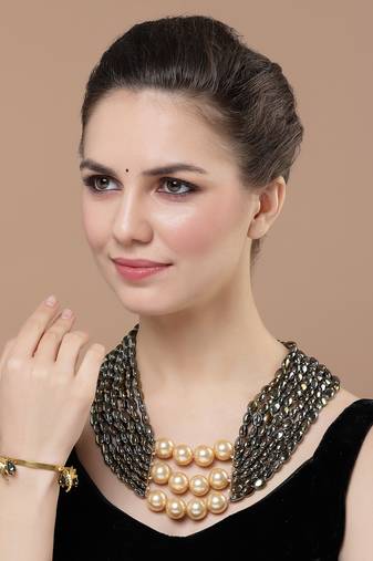 Gold & black designer bangle with pearls &  natural stones