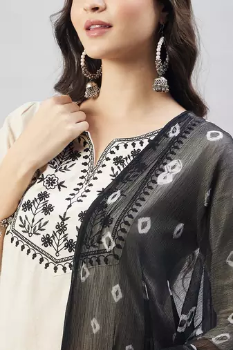 Winered woman off-white embroidered kurta set with chiffon dupatta