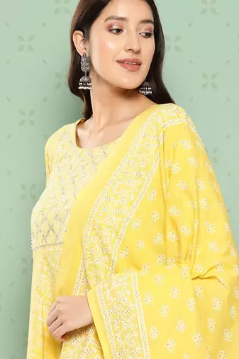 women yellow floral anarkali kurta pant and dupatta set
