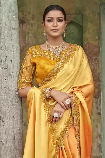 Dazzling Alphanso Yellow Sequined Satin Festive Wear Saree With Blouse