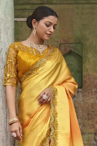 Dazzling Alphanso Yellow Sequined Satin Festive Wear Saree With Blouse