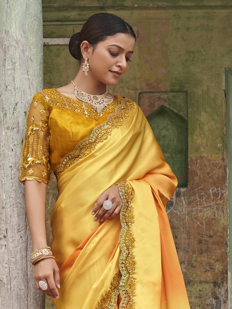 Dazzling Alphanso Yellow Sequined Satin Festive Wear Saree With Blouse