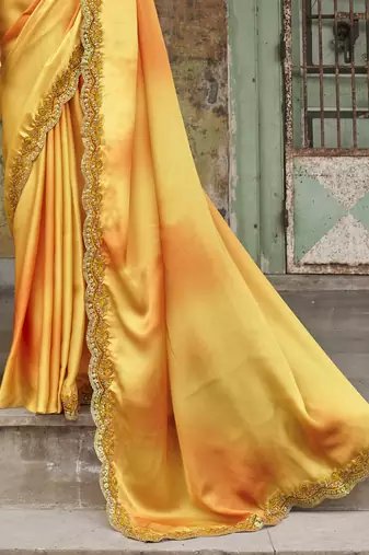 Dazzling Alphanso Yellow Sequined Satin Festive Wear Saree With Blouse