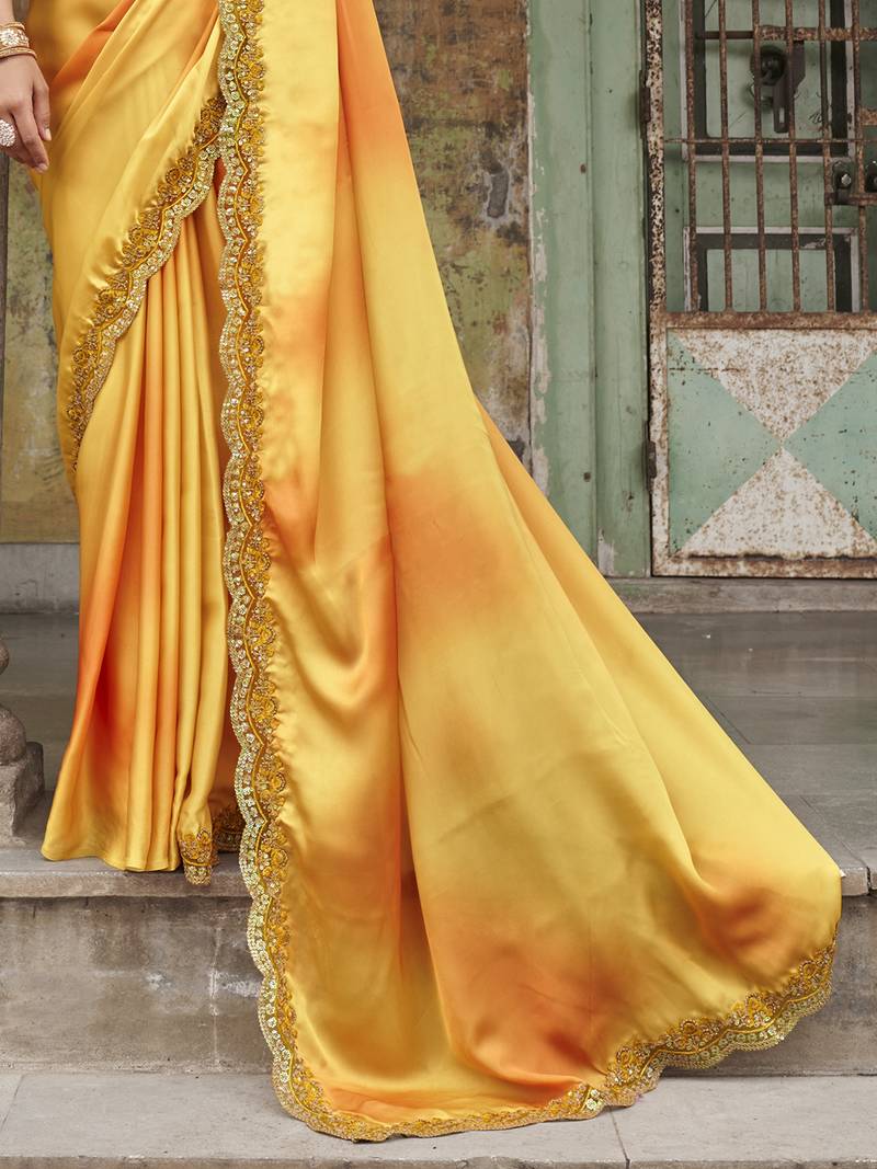 Dazzling Alphanso Yellow Sequined Satin Festive Wear Saree With Blouse