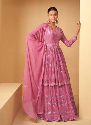 Pink Georgette Based Party Wear Peplum Style Suit For Women 1