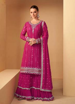Rani Pink Georgette Based Party Wear Peplum Style Suit For Women 1
