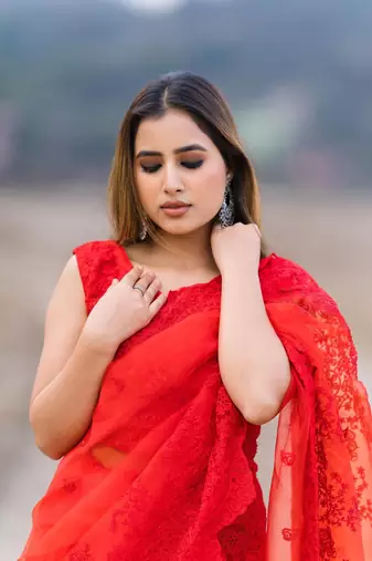 red organza embroidered saree with unstitched blouse piece