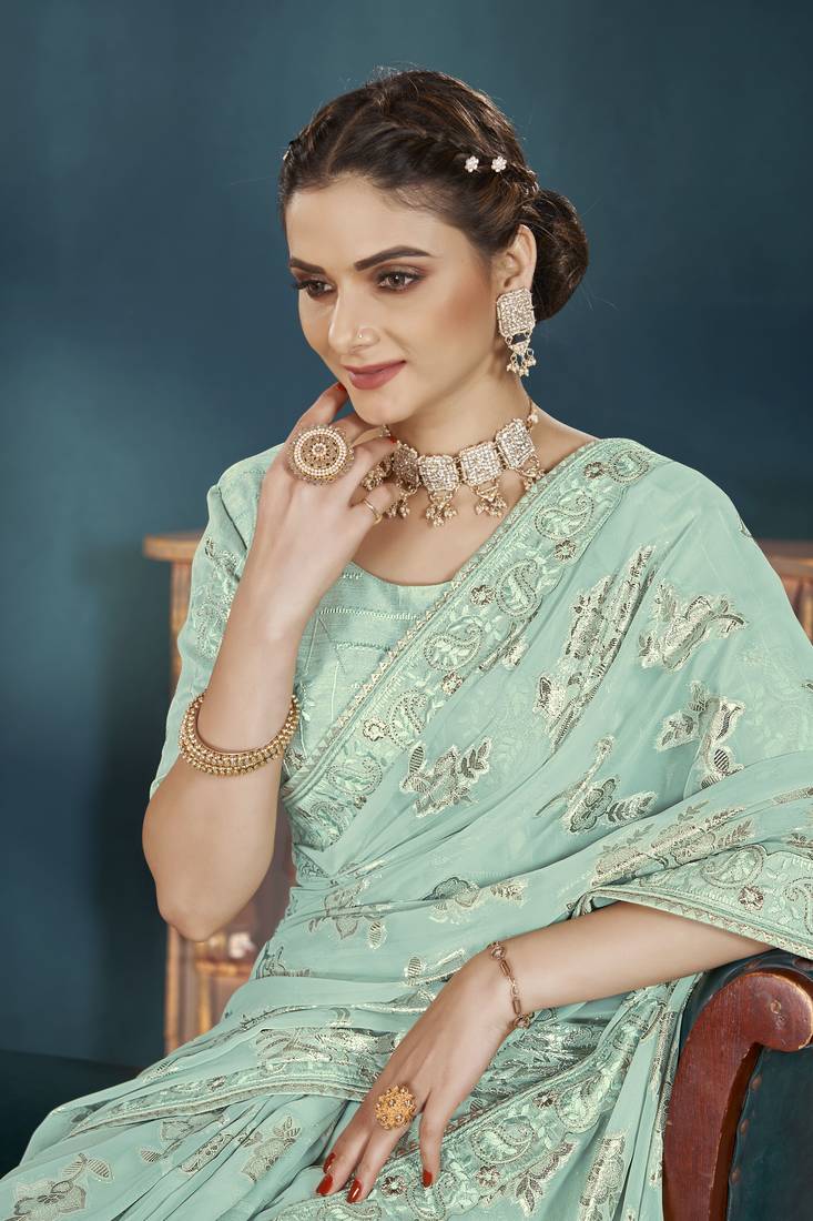 Manohari traditioal light blue georgette patch work saree for women with unstitch blouse piece