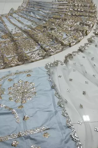 Glamorous Grey Zari with paper mirror Embroidered Net fabric lehenga choli