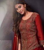 Red rangoli with coding sequence embroidery work salwar kameez Dupattas