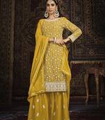 Yellow color embroidered georgette sharara suit