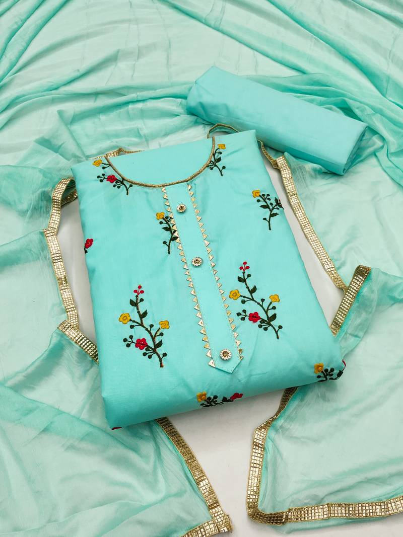 Elegance redefined in embroidered dress material suit