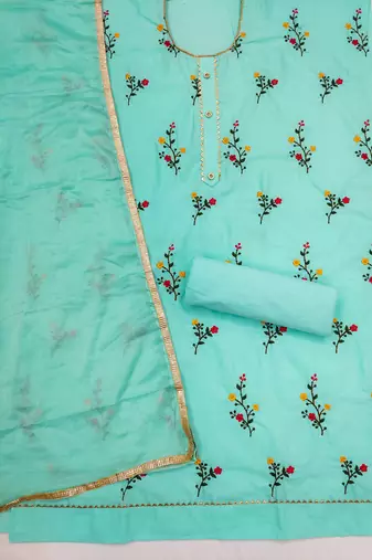 Elegance redefined in embroidered dress material suit