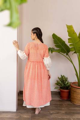 Orange hand block printed cotton dress with white inner dress 3