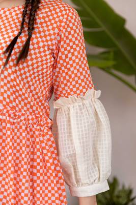Orange hand block printed cotton dress with white inner dress 5