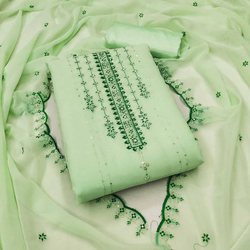 Graceful georgette top with santoon bottom salwar suit dress material