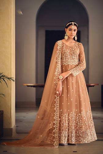 Peach color net heavy embroidered wedding wear anarkali suit