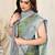 Light green chiffon color block / block print zari line border saree with unstitched blouse piece