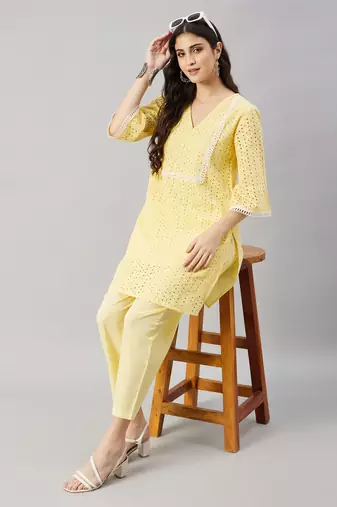 Winered woman yellow shiffli kurta sets with lace detailing