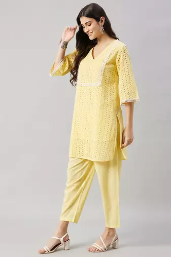 Winered woman yellow shiffli kurta sets with lace detailing
