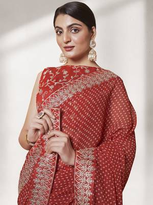 Maroon Color Georgette Fabric Bandhani Saree With Designer Lace And Blouse 2