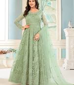 Pista green color net heavy embroidered wedding wear anarkali suit