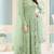 Pista green color net heavy embroidered wedding wear anarkali suit
