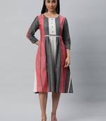 Pleated dress with handwork detailling.