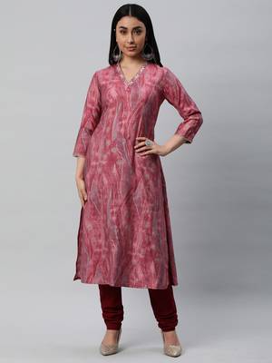 Printed a line kurta with embroidery detail on the neck. 1