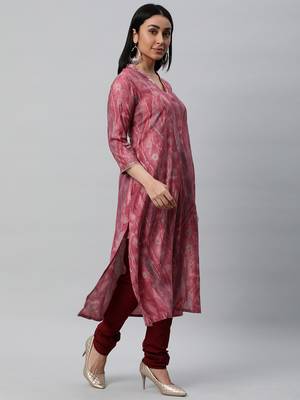 Printed a line kurta with embroidery detail on the neck. 4
