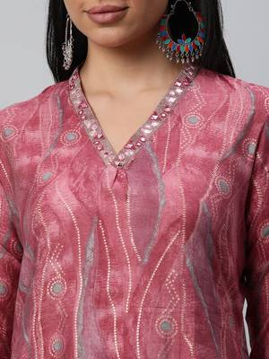 Printed a line kurta with embroidery detail on the neck. 5