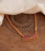  heartin balls chain medium length 20" with ruby pendant one gram gold